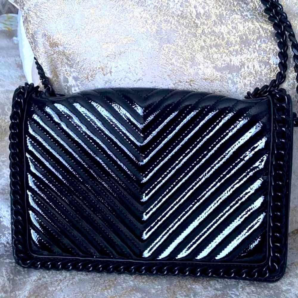 ALDO black purse with red interior